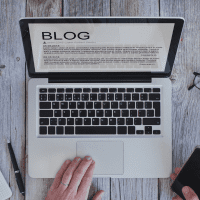 Screenshot of a blog webpage featuring articles, images, and navigation menu.