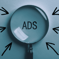 Screenshot of a webpage highlighting paid advertisements with markers indicating sponsored content.